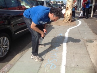 Dave Engel inspects his sea-level rise message. 