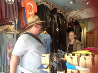 Ken Brucker talks with employee at   Surf Shop