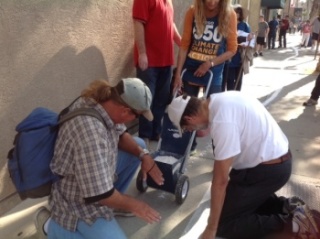 Bill Avrin, assisted by 3rd generation Mission Beach resident Robby Shea, gives MIchael a break.  