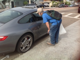 Michael Brackney chats up a Camaro driver who stopped to see what was going on.  