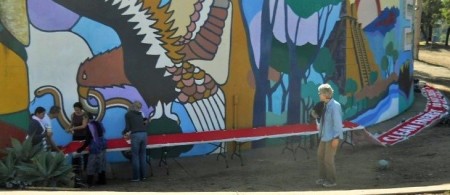 Bev surveys the banner wrapping around the Centro Cultural. 