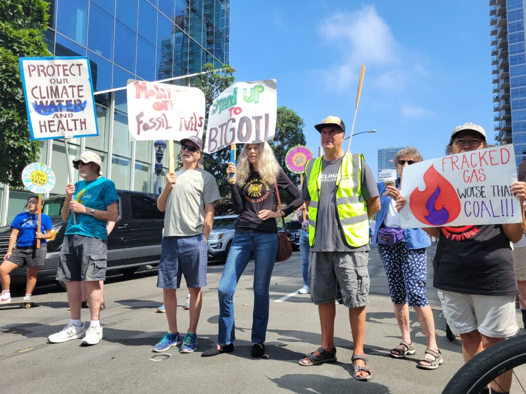 People holding protest signs