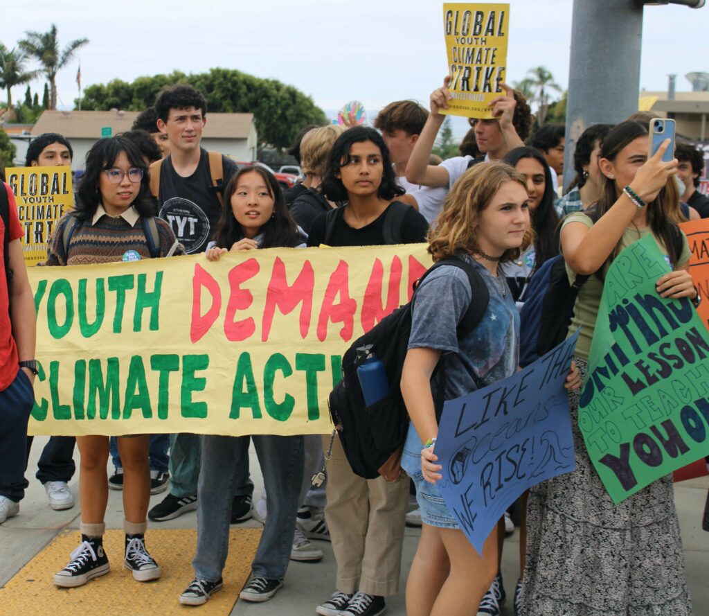 students holding signs