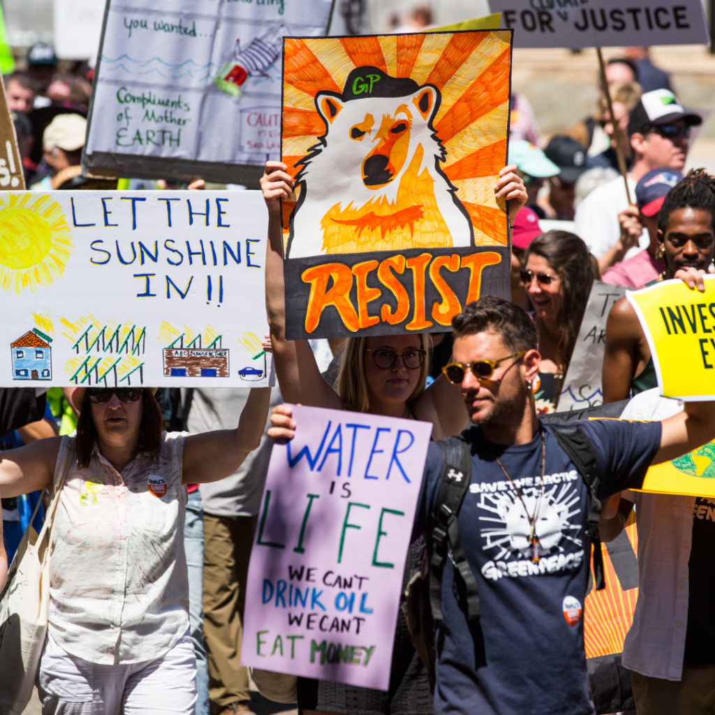 People holding protest signs 