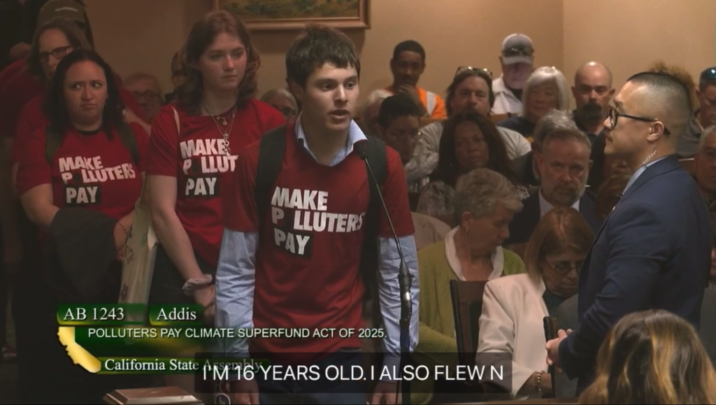 Kobi Schneider, Youth v. Oil Federal Policy Lead, talking in front of the committee.