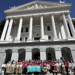 People standing in front of the CA Capitol Building