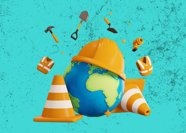 Earth with construction hat and construction cones around it.