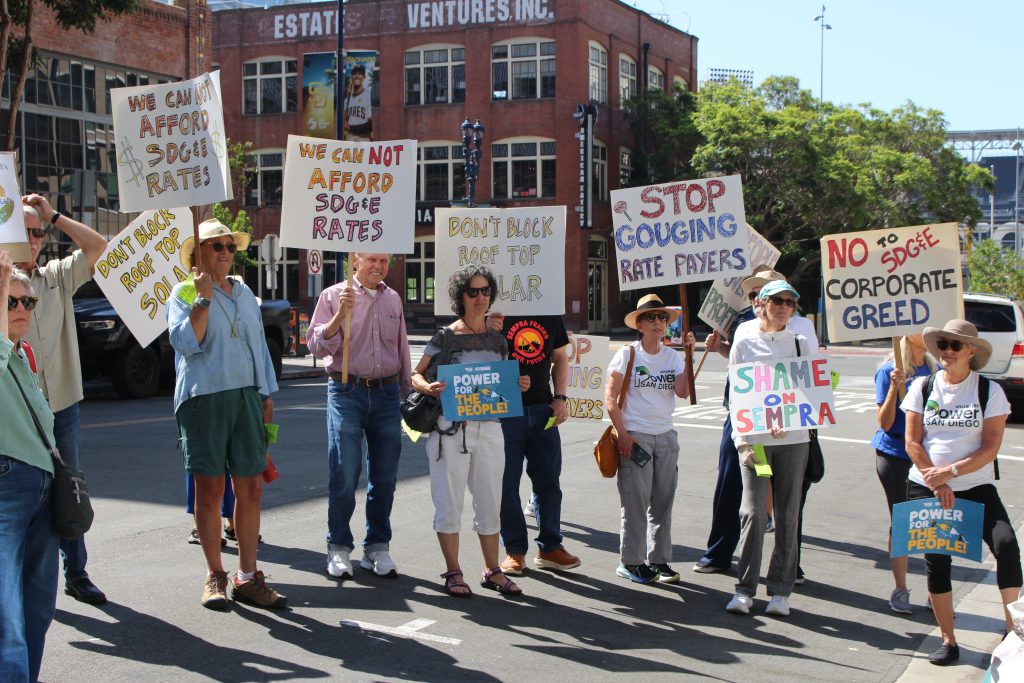 People holding protest signs