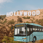 Bus in front of the Hollywood sign