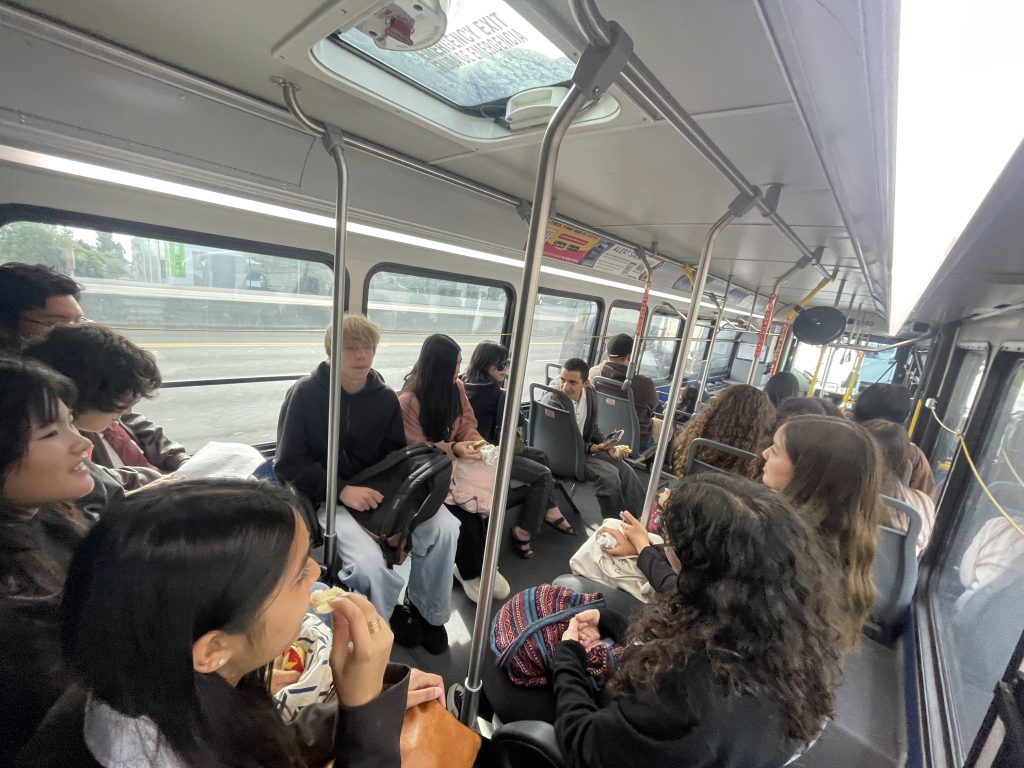 Group of youth riding on a bus