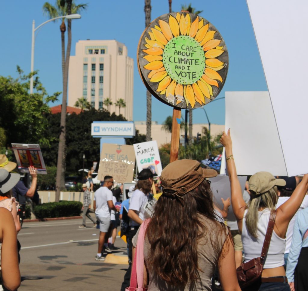 Person holding a protest sign