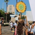 Person holding a protest sign