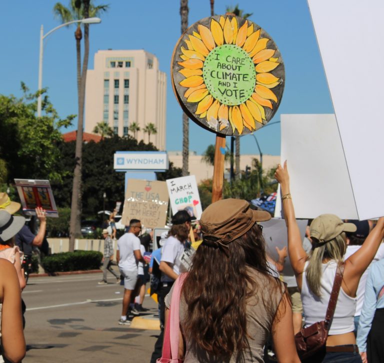 Person holding a protest sign