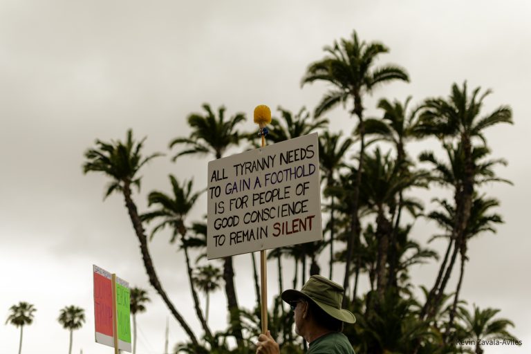 Person holding protest sign