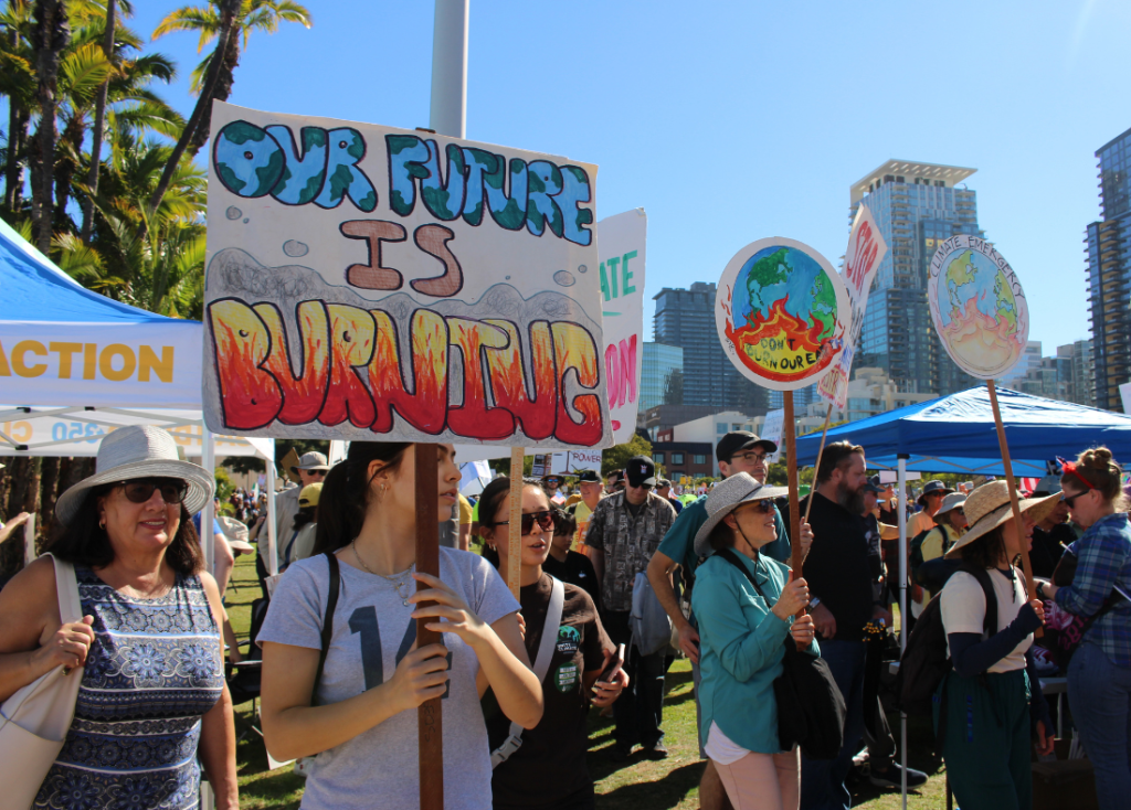 People holding protest signs